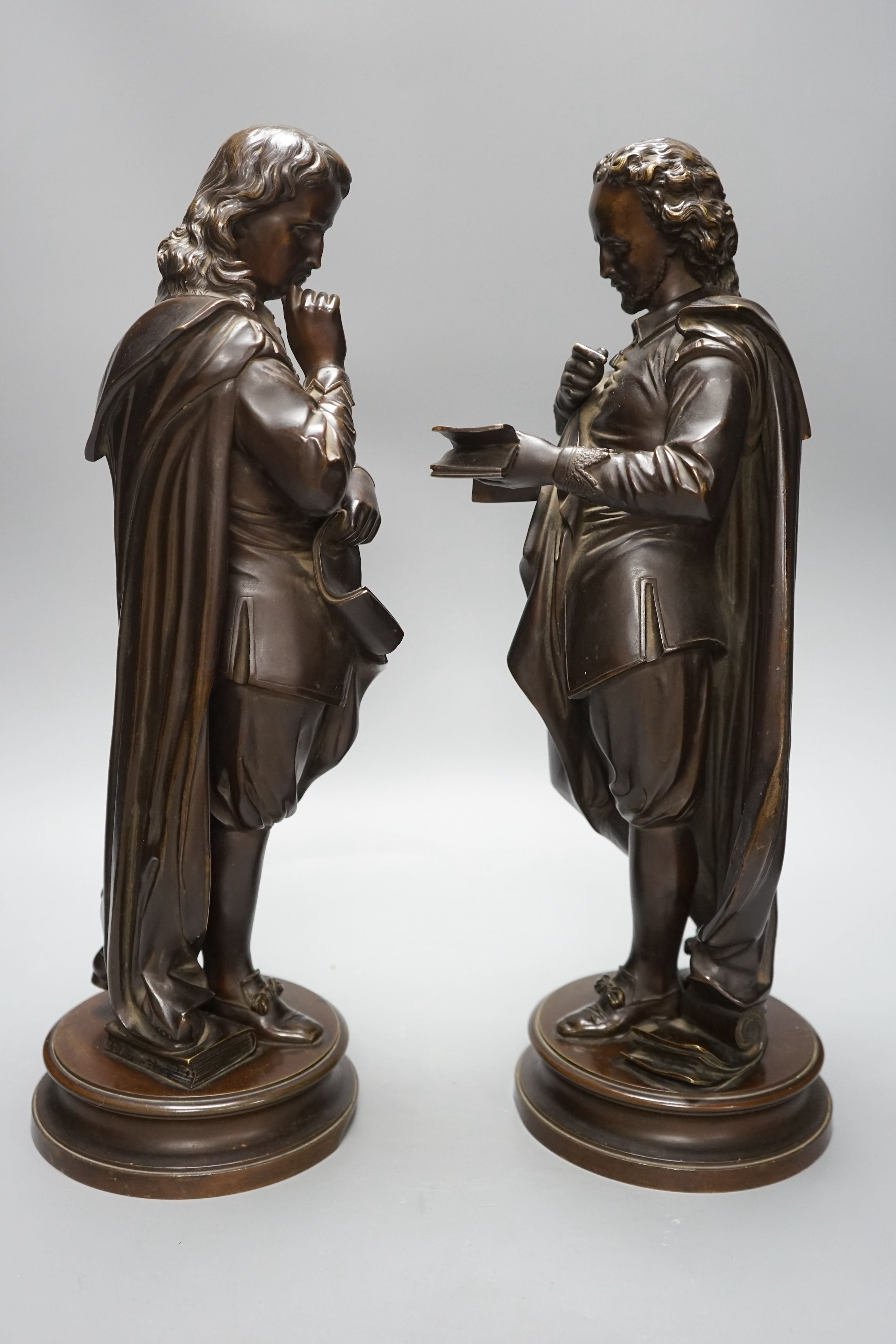 A pair of late 19th century French bronze figures of Shakespeare and Milton, tallest 44cms